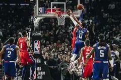 爱游戏部门-湖人险胜爵士升至西部第二